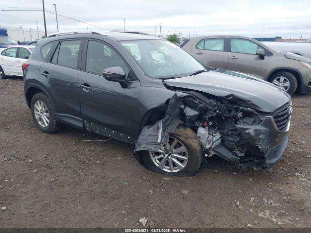  Salvage Mazda Cx